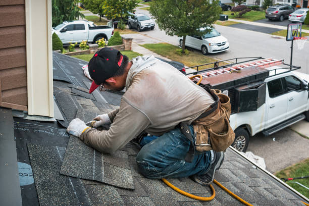 Professional Gutter Installation technician working in Hillsboro, IL